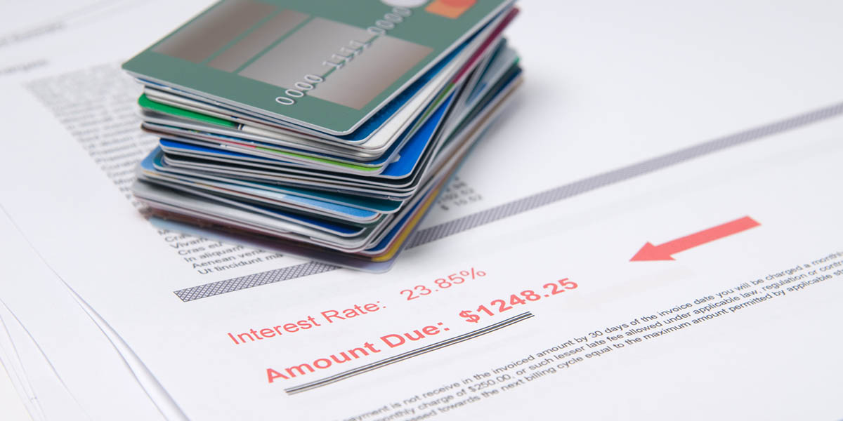 Stack of credit cards on account of value in red