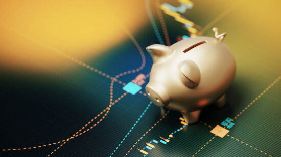 Gold Colored Piggy Bank Sitting over A Bar Graph - Savings Concept