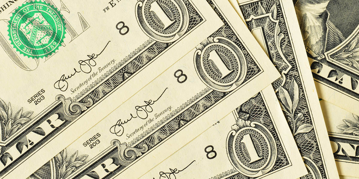 US Dollars paper currency closed up background